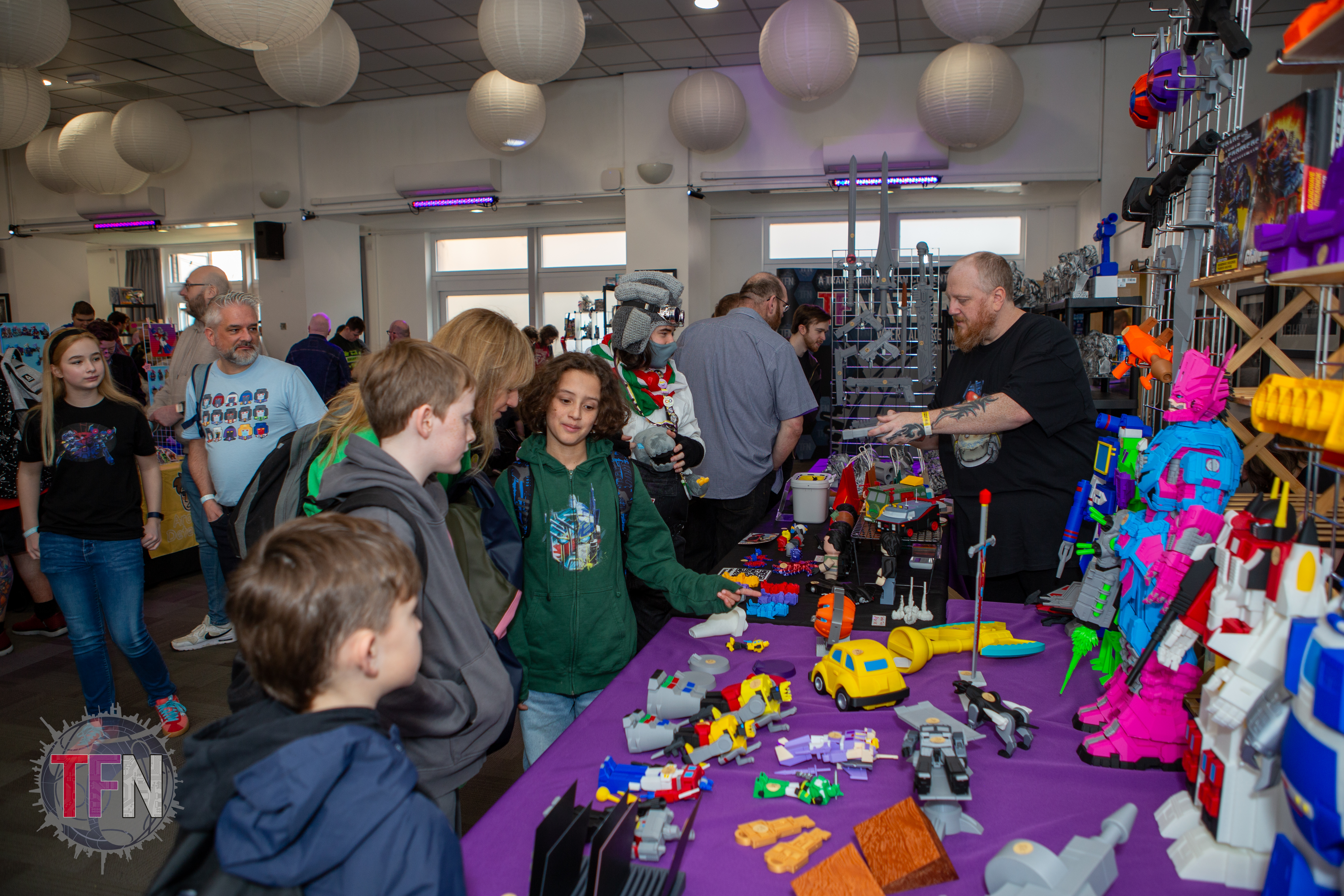 Attendees visiting a colourful trader stall at our last Manchester event